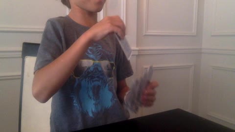 kid secretly finds card