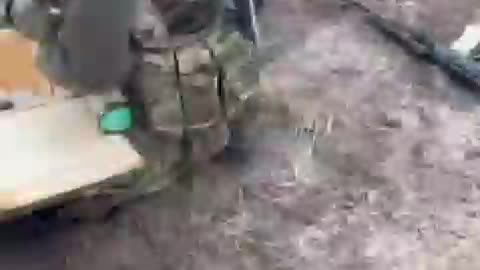 Members can be seen with AKS-74 rifle, possible UKROP UAR-15 rifle and 73mm SPG-9M