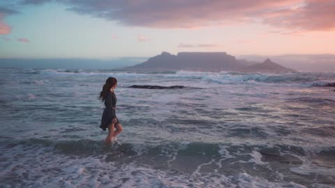 Girl in the arms of the ocean