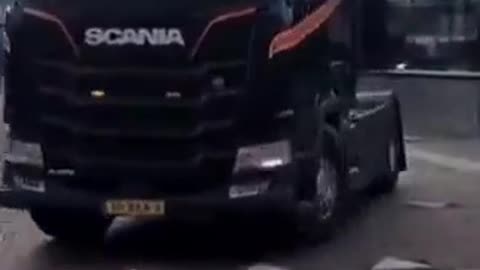 Huge! Dutch truckers drive in a convoy through Friesland, Netherlands,