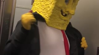 Person subway train spongebob head costume