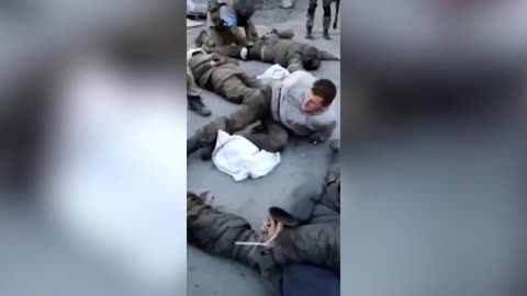 GRAPHIC; Ukraine to probe after videos show alleged Russian POWs shot, abused