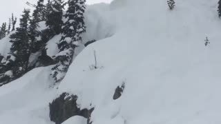 Jerry goes for a huge cliff jump on skis