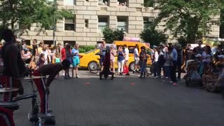 NYC street performer flips