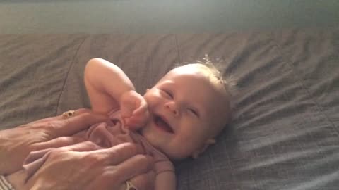 Darling Baby laughs From mommy Tickles