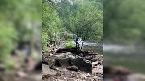 Walking into Abrams Falls in the Great Smoky Mountains