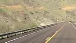 TRAINEE Driving on a canyon road in Arizona