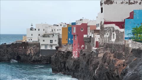 buildings on the coast of atlantic ocean in punta brava small town near puerto de la cruz city