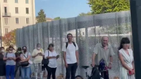 Hungry Italians at food distribution begging for bread and milk. Milan, August 27.