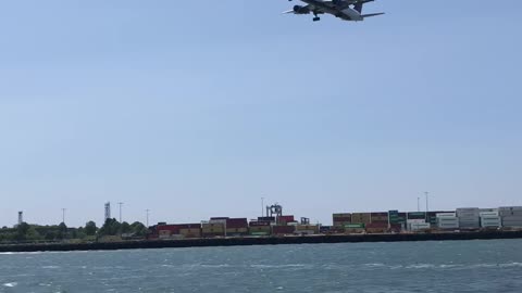 ferry boat cruise with 747 flying over our head in Boston