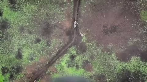 Russian soldier catches and throws bomb dropped by Ukrainian drone