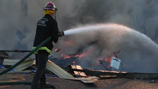 Fire Fighters Fighting Large Blaze