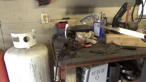 Forging a knife, making the handguard