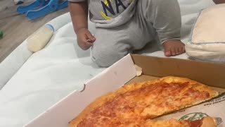KAANZ WANTS THE FIRST SLICE OF PIZZA