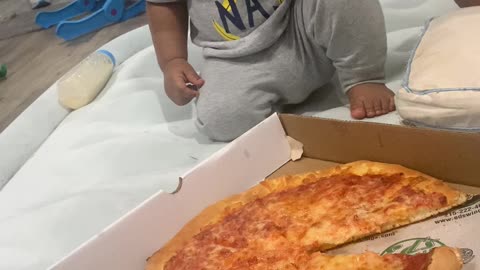 KAANZ WANTS THE FIRST SLICE OF PIZZA