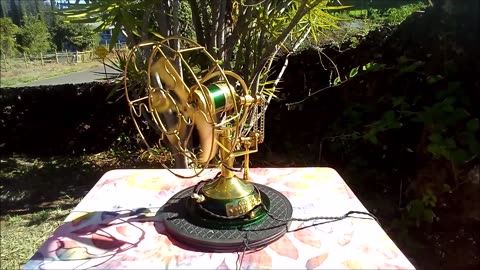 Miniature all brass Orbiting fan