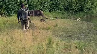 Bear Gets Close to Guided Fisherman