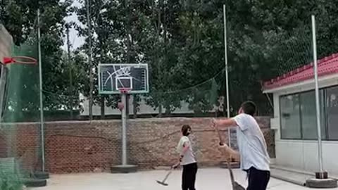 Shooting basketballs with shovels!
