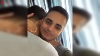 Man kissing other man due snapchat filter