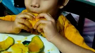 Eating mango