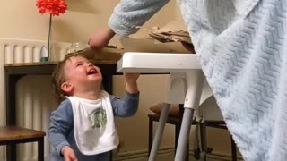 Baby Delighted By Recycling