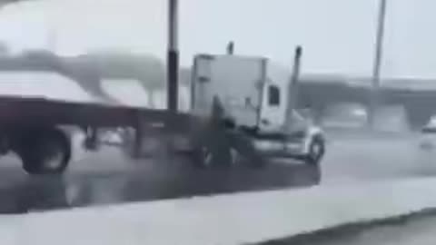 Truck hitting bridge
