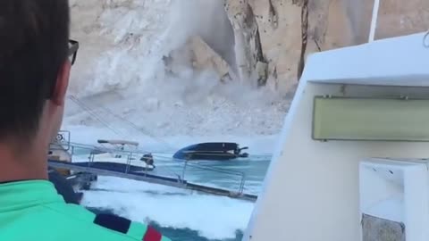 Cliff collapses on Greek beach, injures tourists