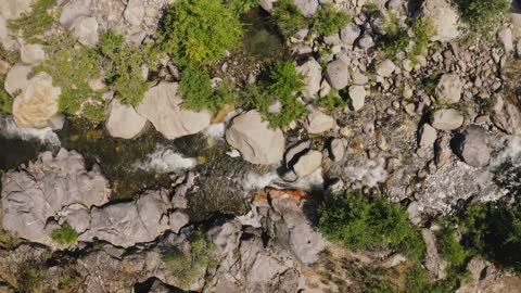 Drone Footage of a Creek Flowing through Rocks