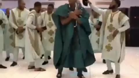 African Groom Dancing At His wedding