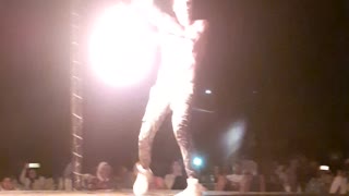 Spectacular guy control fire on the street show