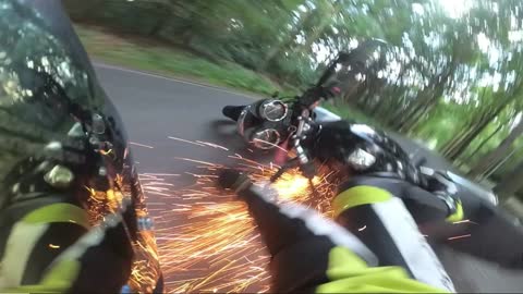 Sparks Fly From Intense Motorcycle Wreck