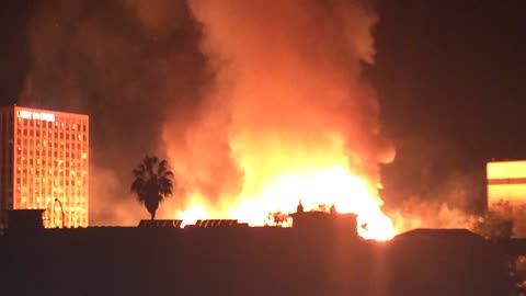 Massive fire in downtown Los Angeles shuts down freeways