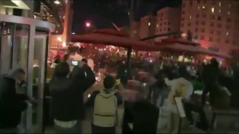 Antifa and BLM shooting Fireworks at people dining