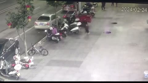 Chinese boy narrowly escapes flying manhole covers after firework sparks trigger methane explosion