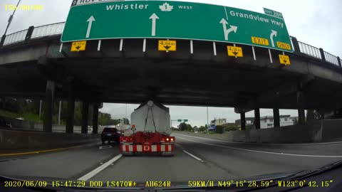 Oversize Load Scrapes Against Overpass