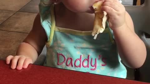 Baby loves burrito so much she starts dancing!