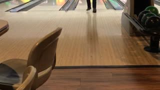 Guy sends it at bowling alley