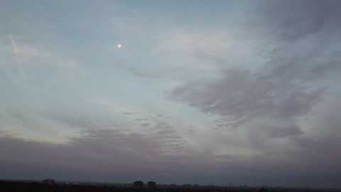Beautiful Sunrise and the Moon