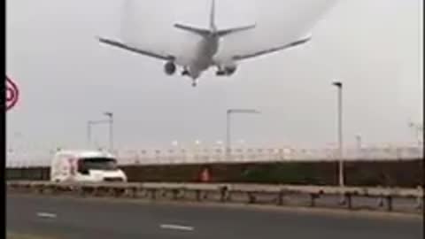 A plane flying through there cloud