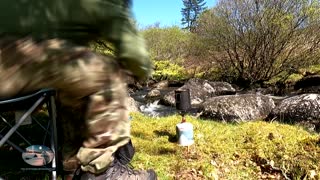 Morning wildcamping by a river