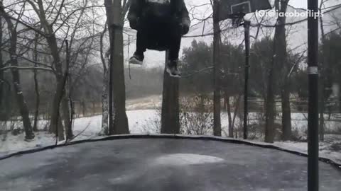 Backflip on snowy trampoline lands on neck