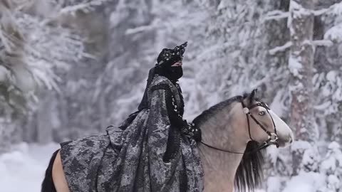 Lady riding horse