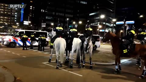 Netherlands: Police use batons to disperse anti-COVID restrix protesters in Rotterdam - 19.11.2021