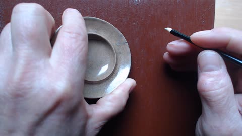 Traditional, lacquer based kintsugi, polishing #2 silver