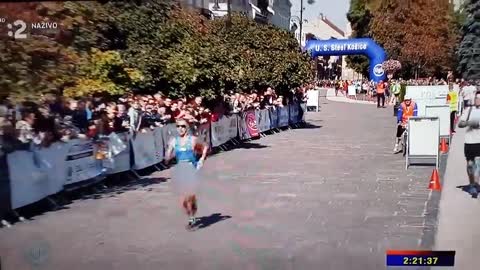 What a balls up! Runner's privates pop out of his shorts at the end of marathon