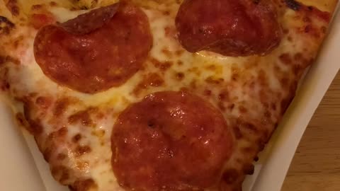 Trying A Pepperoni Slice Of Pizza From Long Wongs Restaurant In Phoenix Arizona!