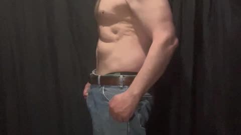 Fat man flexes his flab 13 of 14