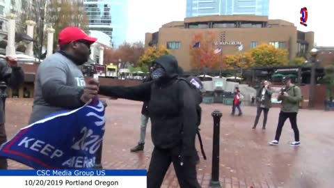 Masked Portlanders Calls Black Trump Supporter "A Traitor" After Trying To Steal His Trump Flag