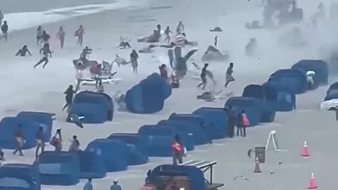 footage capture waterspout ripping through crowded beach #short