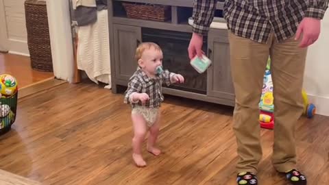 Little Girl Humorously Uninterested In Baby Brother's First Steps